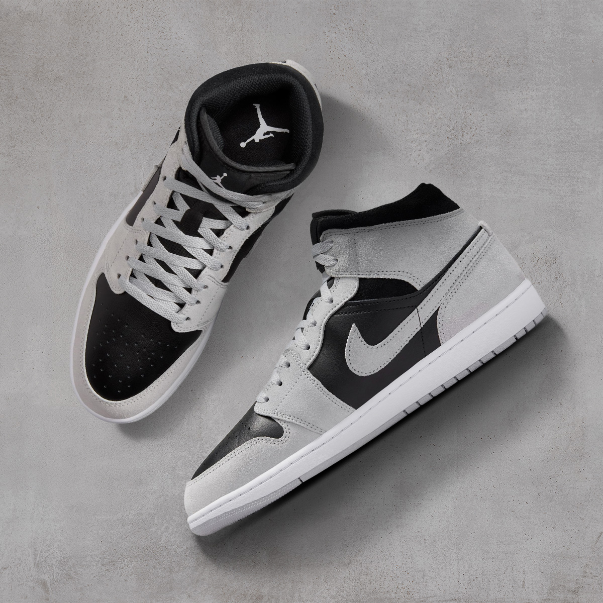 Jordan high-tops in grey and black, photographed from above